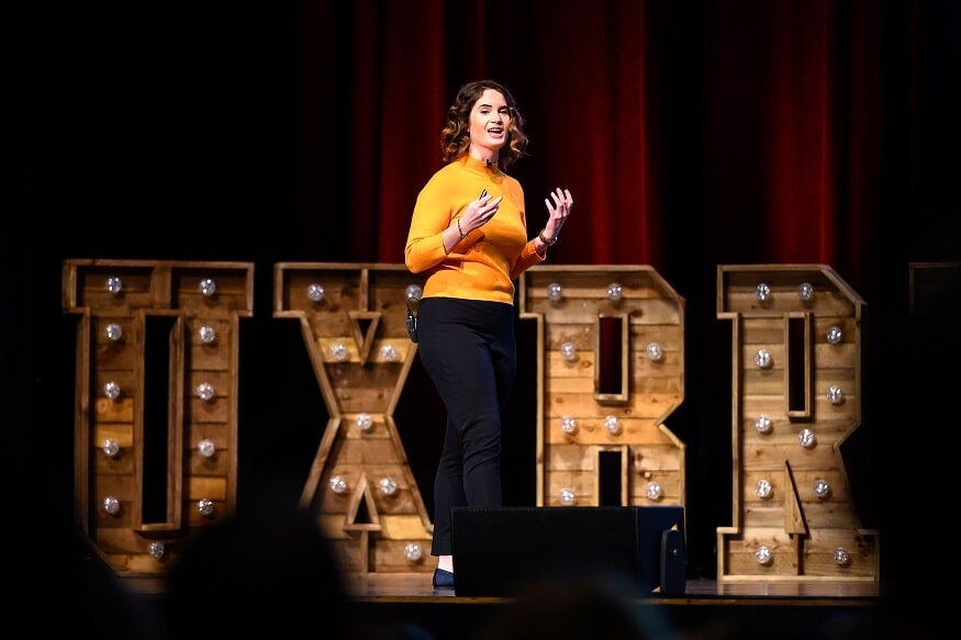 ProdPad CEO Janna Bastow speaking at UX Brighton conference 2022